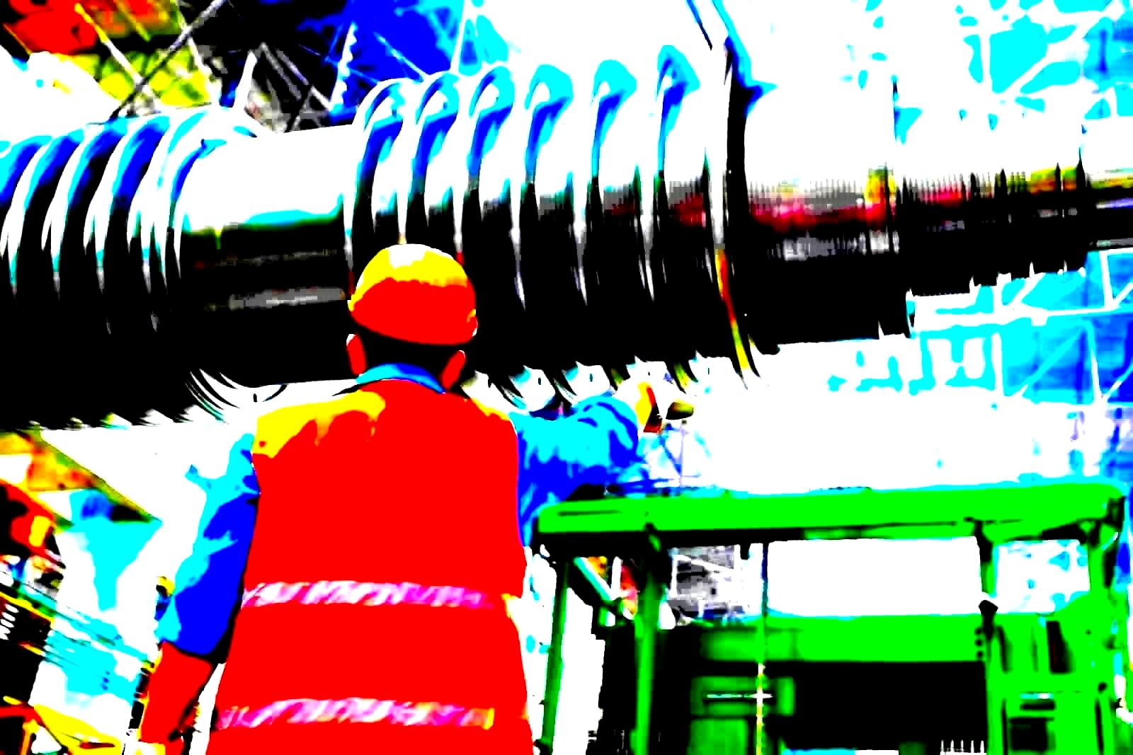 Aerospace manufacturing worker on an aircraft assembly line