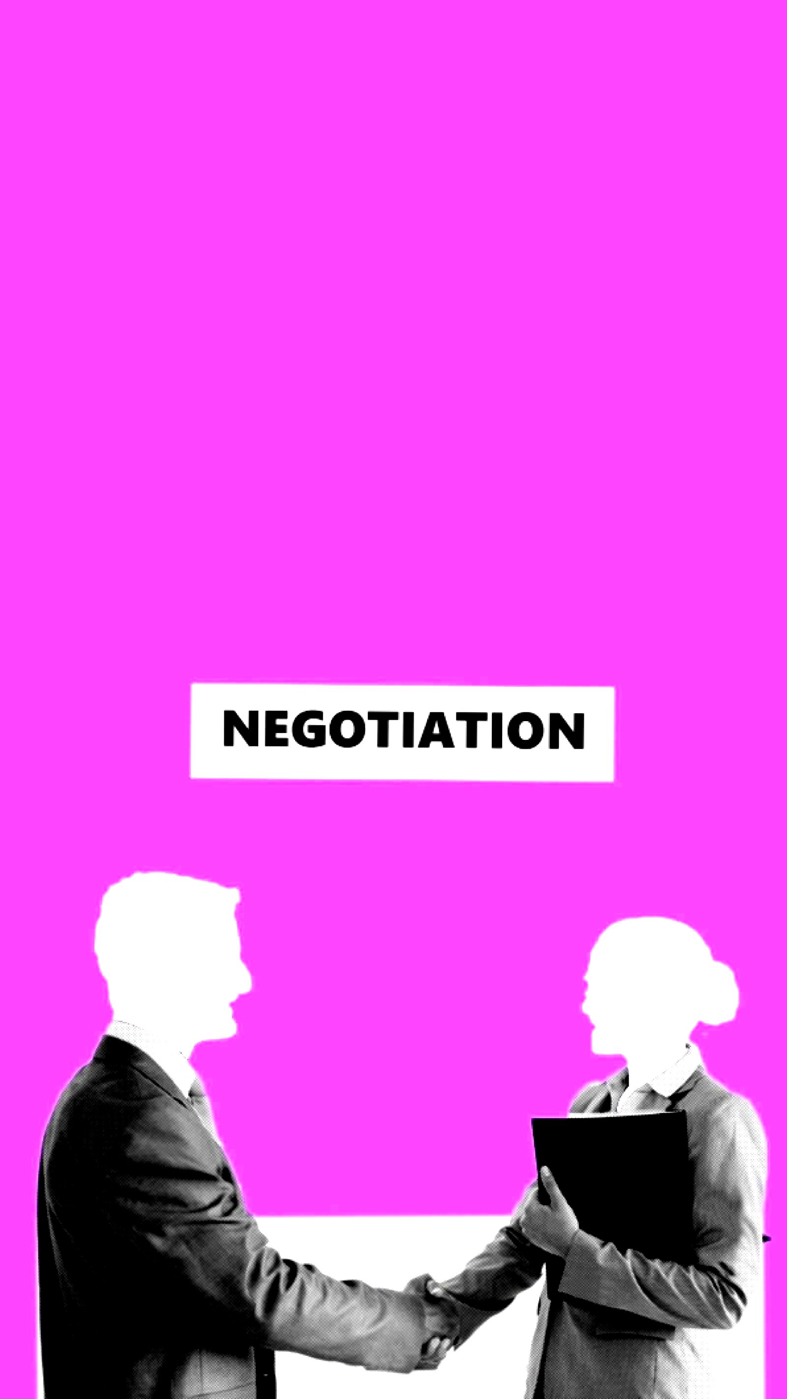 Business colleagues seated at a table during a negotiation meeting
