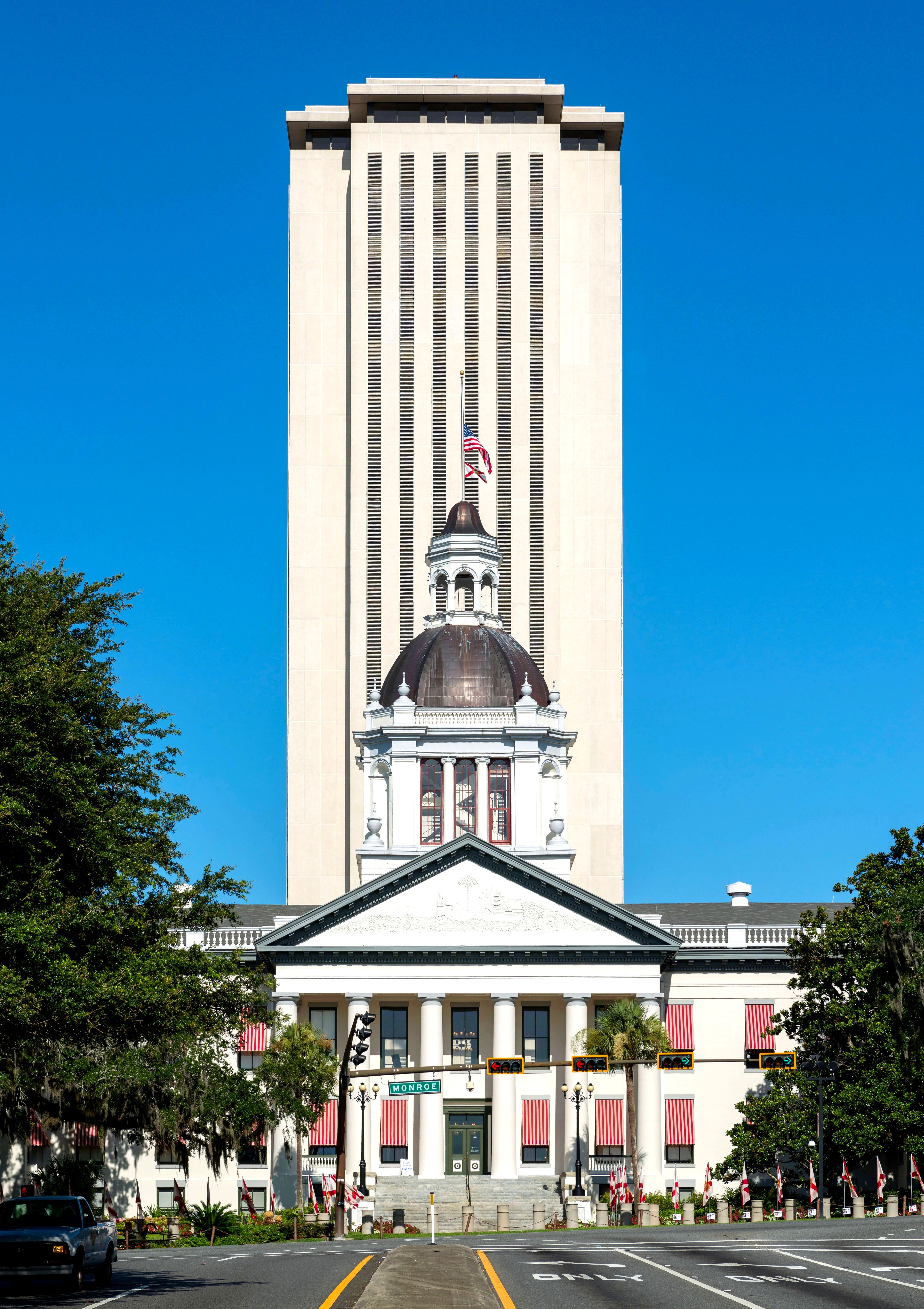 Florida State Capitol building in Tallahassee with palm trees in the foreground