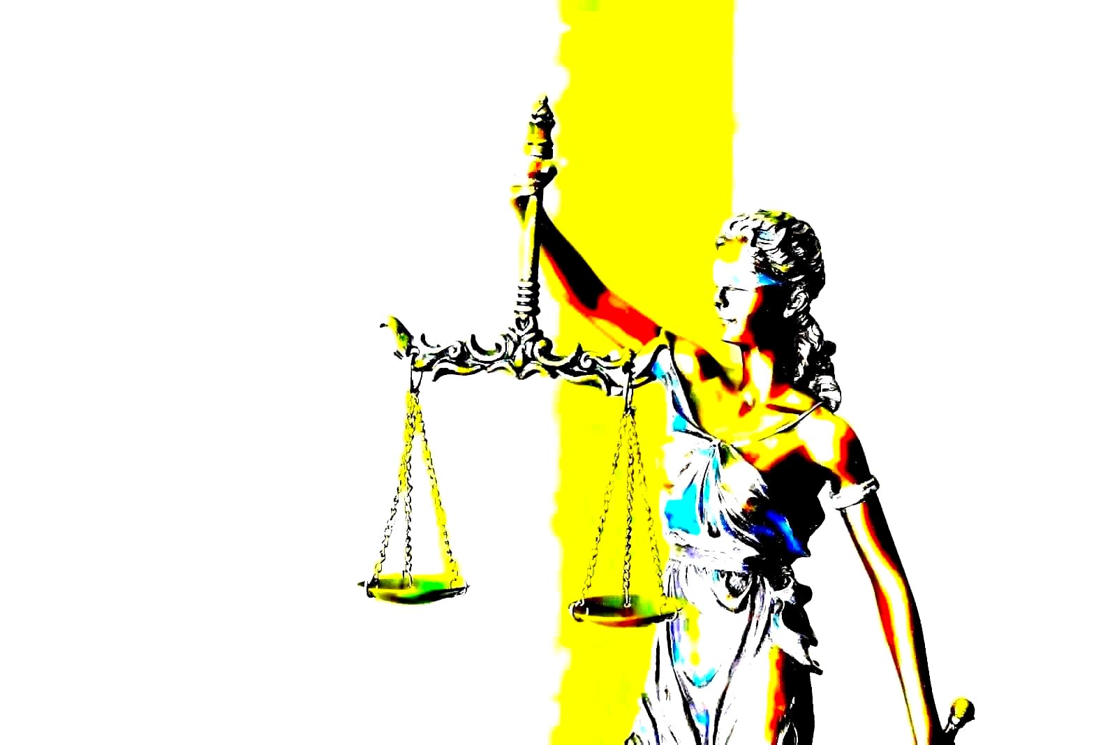 Legal volumes and statute books on a wooden desk