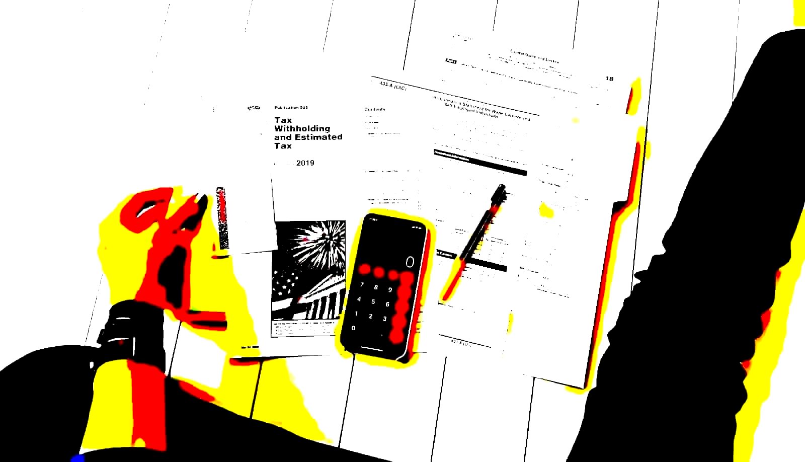 Financial analysis documents and calculator on a desk