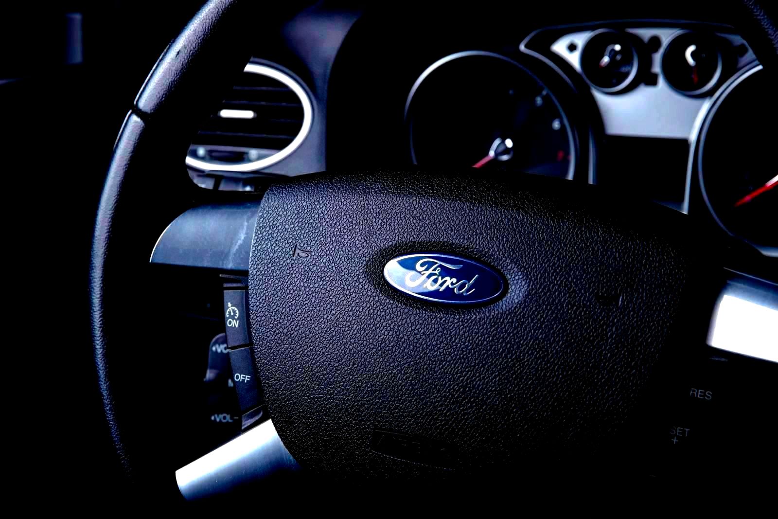 Close-up of a Ford steering wheel inside a vehicle